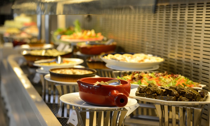 Breakfast or Lunch Buffet with Beverages for Up to Four at Sura at Ramada Abu Dhabi Downtown (Up to 55% Off)